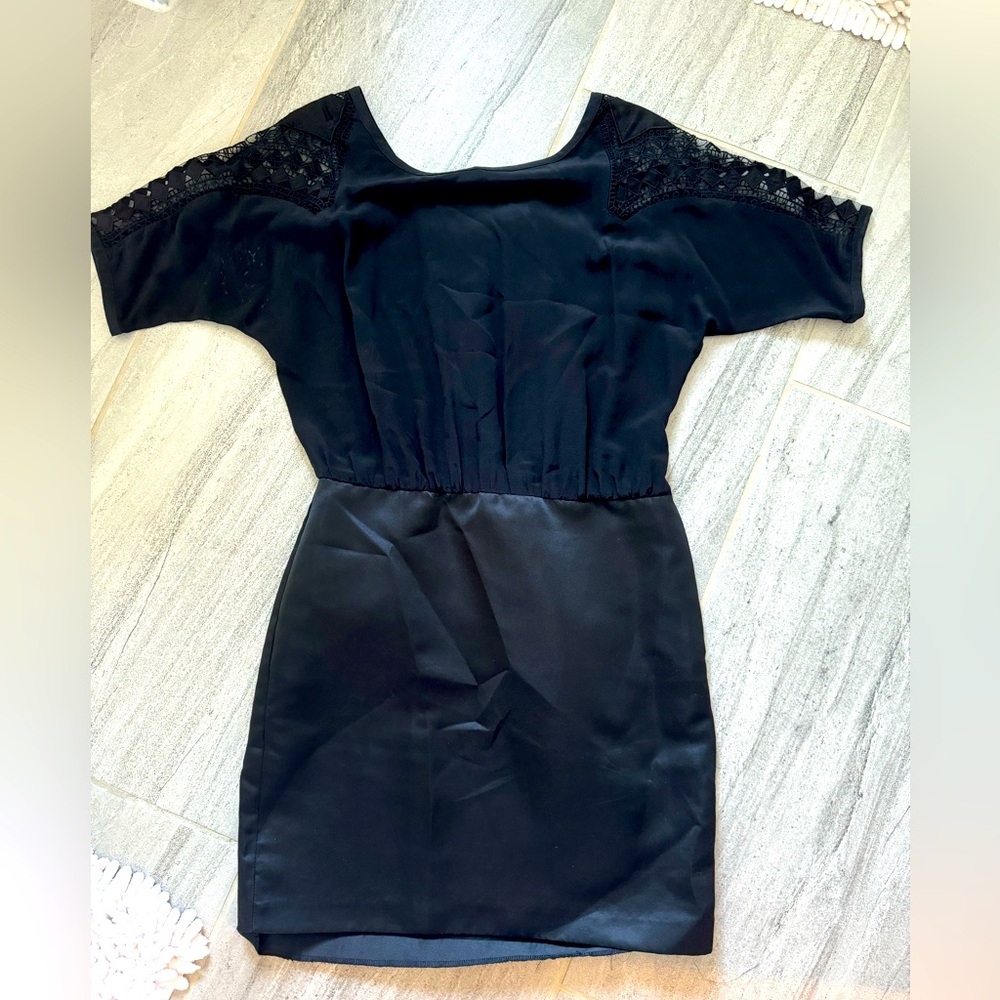 Really special mixed media black dress from Paris. Les petites.